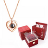 Projection necklace and rose box in a romantic, candlelit setting