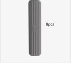 A single gray ribbed rectangulars sponge with the text '8pcs' printed to the right indicating a pack size.
