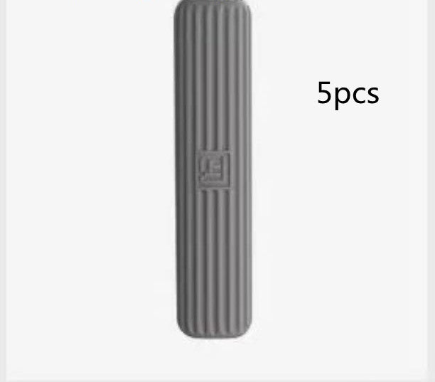 A gray spounge  with the text '5pcs' printed to the right.