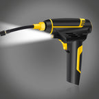 Black and yellow tire pressure  gun on a gray background