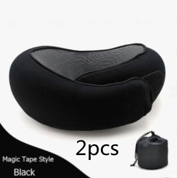 Black neck massager with packaging on a white background