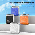Four different colored portable shavers on a railing with a blue sky background.