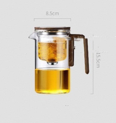 Glass teapot with wooden handle and lid filled with tea, showing dimensions on a light gray background.