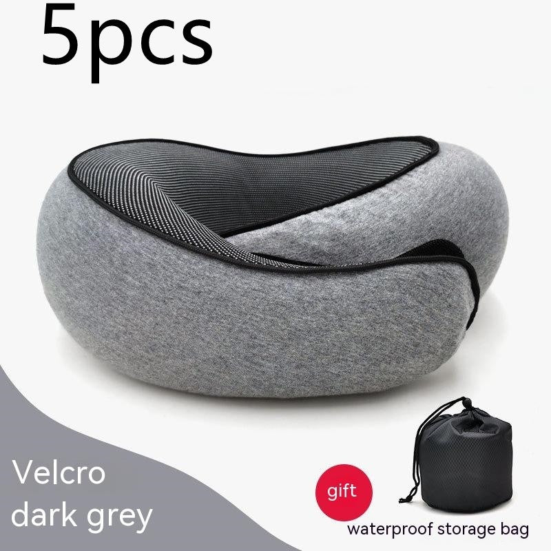 Gray neck pillow with black mesh and a waterproof storage bag on a white background