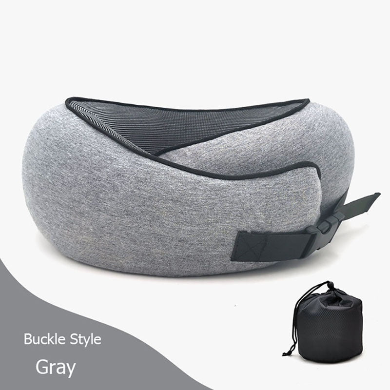 Gray travel pillow with black straps on a white background