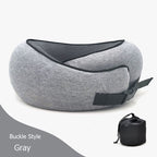 Gray travel pillow with black straps on a white background