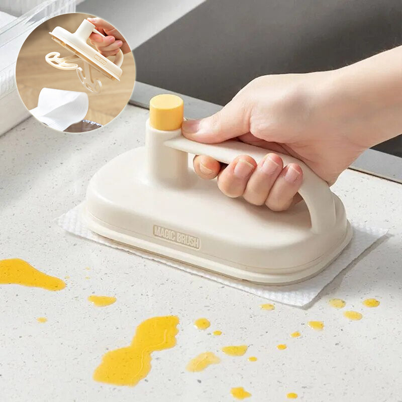 Hand using a cleaning tool on a surface with yellow stains, inset showing close-up of tool.