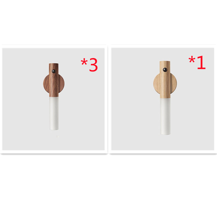 Two wooden pepper grinders with different numbers on a white background