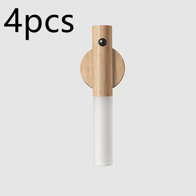 Wooden and white wall hook with '4pcs' text on a light gray background