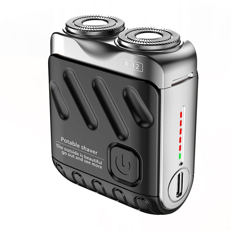 Portable shaver with dual heads on a white background