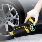 Hand using a digital tire inflator next to a car tire