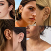 Lifestyle shot of gold hoop earrings in a summer setting