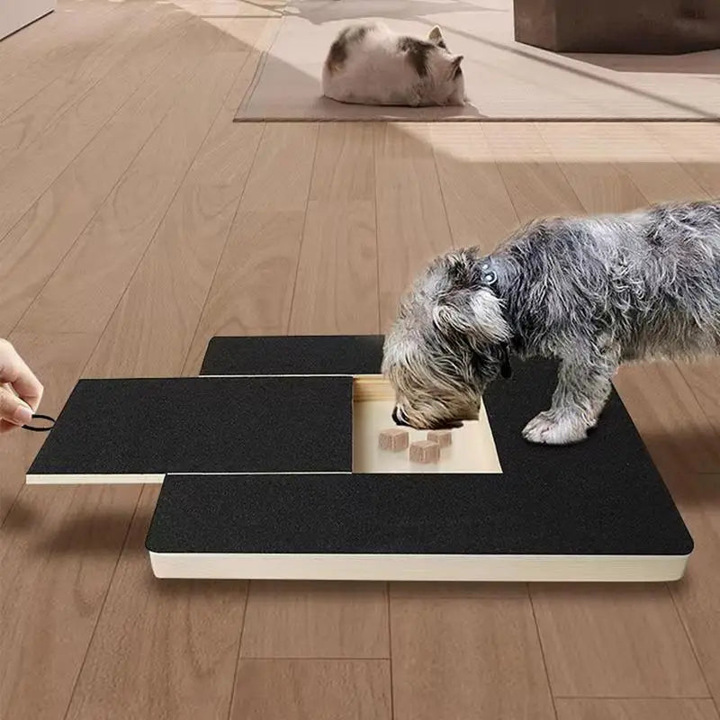 Puppy Dog actively using Pawfect nail trimming scratcher toy