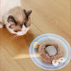 Cat playing with Pet Energizer automatic rolling ball toy