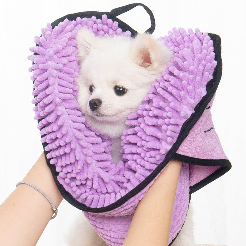 white puppy  wearing a purple super absorbent pet bathrobe